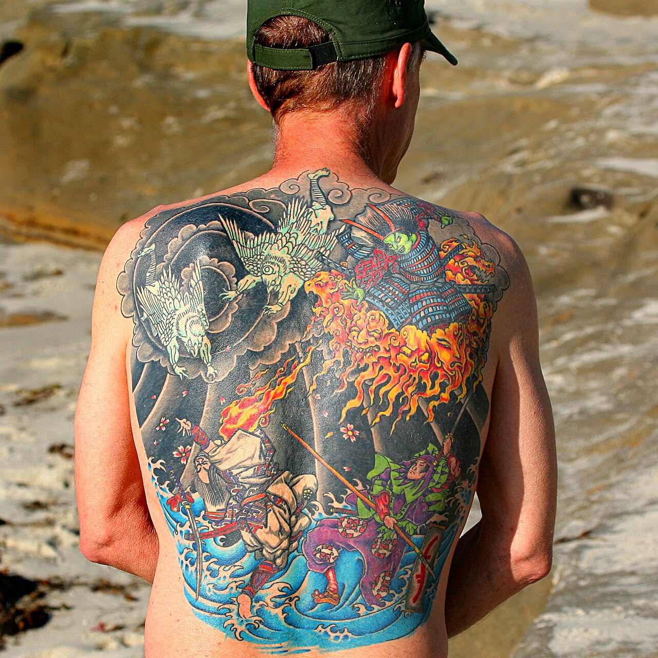 Full-back irezumi with fire and water motifs
