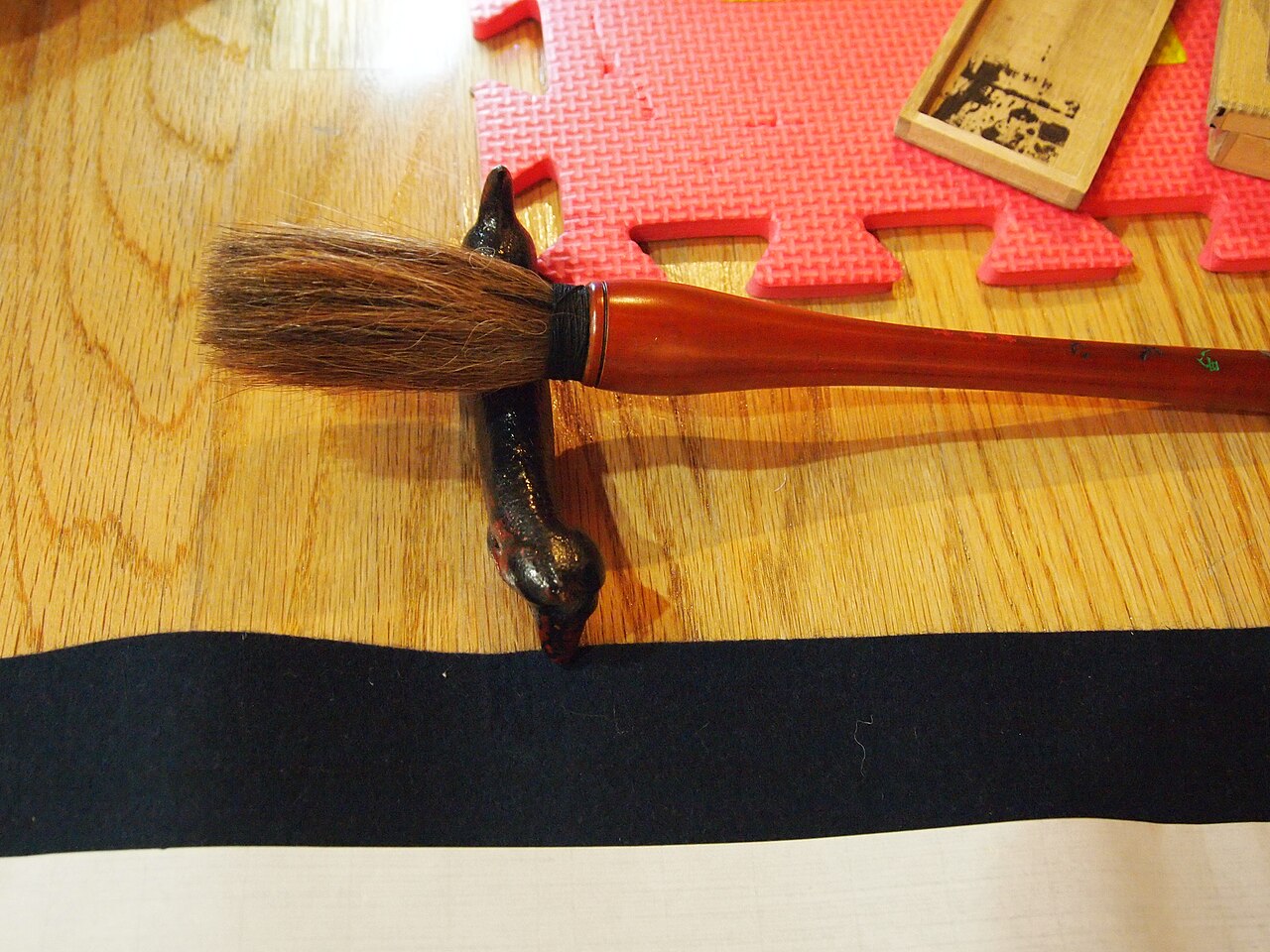 Japanese calligraphy brush (fude) on sumi ink