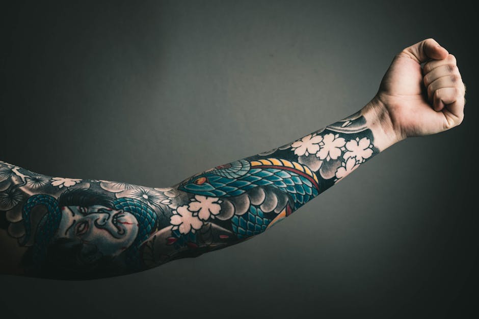Close-up of a Japanese-style full sleeve tattoo on a man's arm