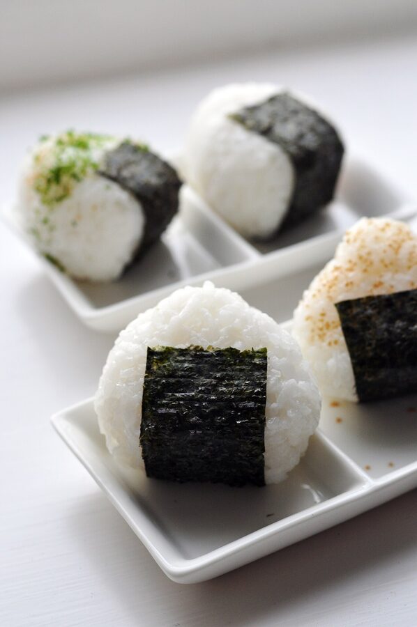 Home-made Japanese rice balls (onigiri) with dried seaweed (nori)