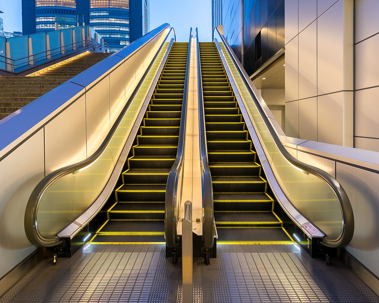 Outdoor escalator at Shinjuku Station Tokyo