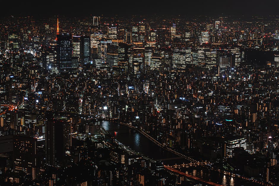 Aerial night view of Tokyo cityscape with neon