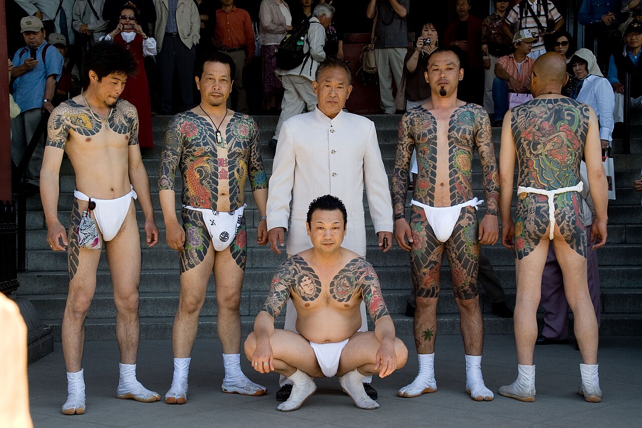 Tattooed yakuza members displaying irezumi at Sanja Matsuri, Asakusa