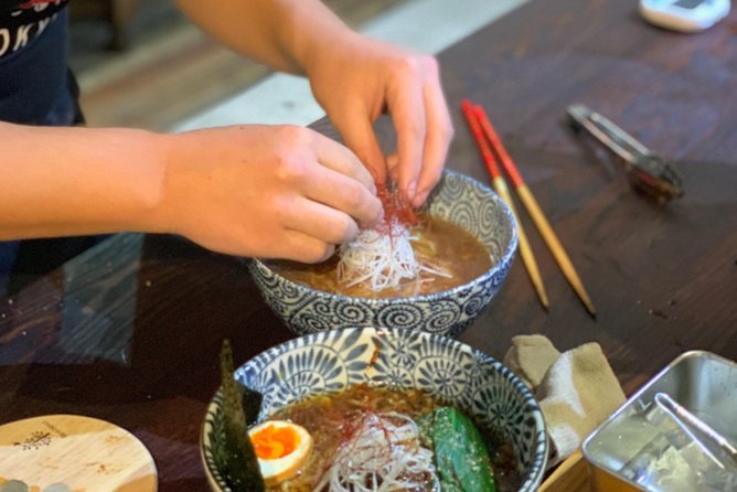 Asakusa Classic Ramen & Crispy Gyoza Cooking Class - Folding gyoza and getting the bottoms crisp