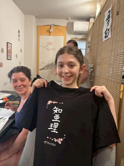 Calligraphy & print your calligraphy on a T-shirt. - Making ink with a Sumi stick and inkstone
