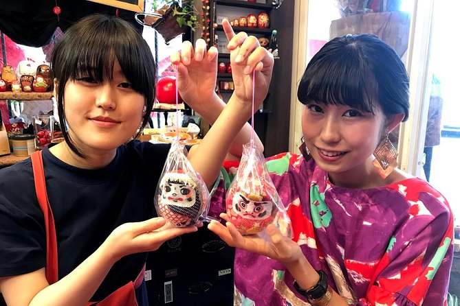 Deep Dive into the World of Daruma Dolls - Writing your wish and painting the face