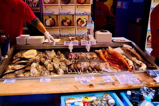 Fish Market & Tokyo Skyline Private Walking Tour - Taking the Yurikamome toward Odaiba