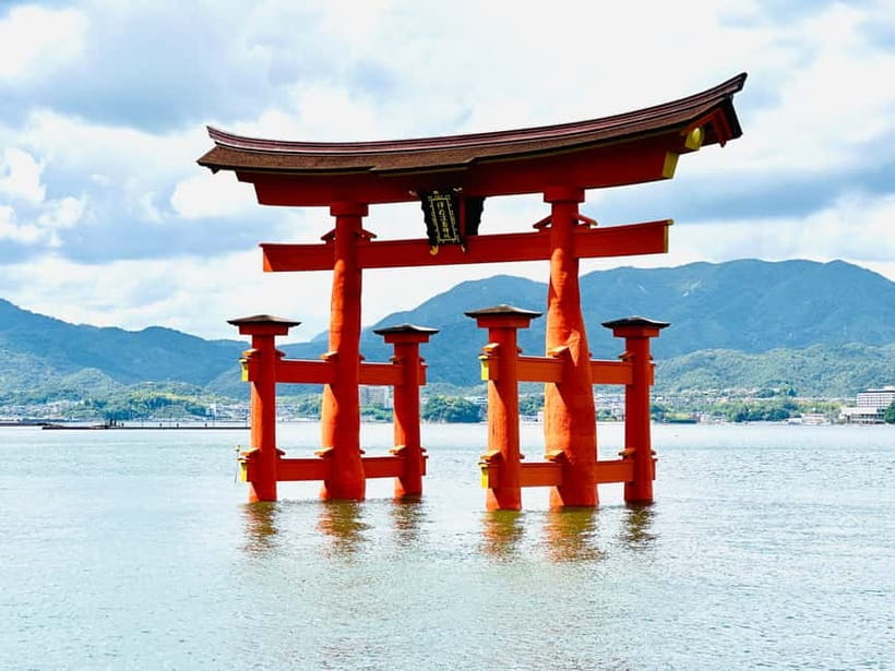 From Tokyo: Hiroshima and Miyajima Day Trip by Bullet Train - Miyajima begins with a ferry and a famous gate