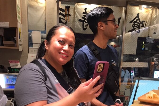 Golden Gai Hidden Eats A Personalized Shinjuku Food Tour By Guide - Hanazono Shrine beside the nightlife district