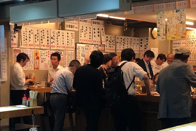 Private Tokyo Food Tour - Retro Akabane Izakaya Experience - Seafood grilling brings the meal home