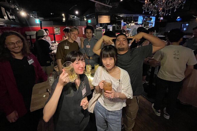 Shinjuku Locals &Traveller Meet&Drink Experience Solo going Party - Check-in, wristbands, and the first drink