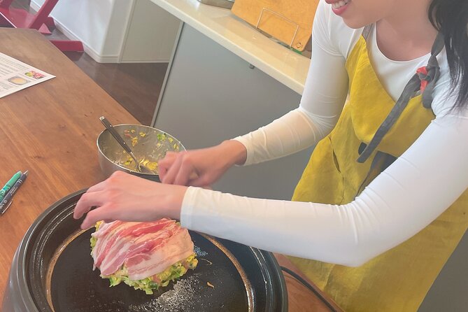 Small-Group Osaka-Style Okonomiyaki Cooking Class - Building your own Osaka-style okonomiyaki