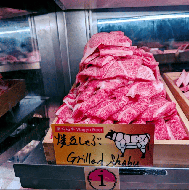 Tokyo: All-You-Can-Eat Wagyu at Nikuya Yokocho Udagawacho - Picking meat from the showcase