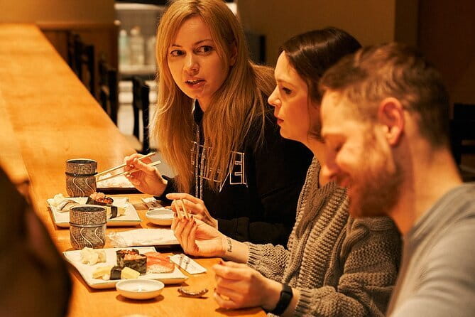 Tokyo: Authentic Sushi Making at a Local Sushi Restaurant - Slicing fish, seasoning rice, and shaping sushi