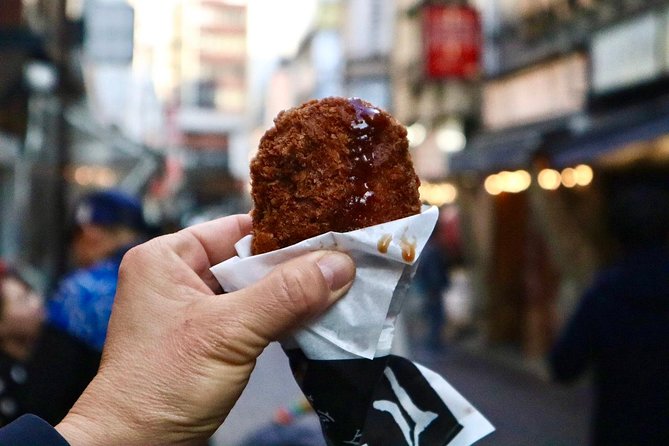 Tokyo: Food Tour in Ueno with 10+ Tastings of Japanese Classics - A 1627 shrine and a Buddhist temple broaden the picture