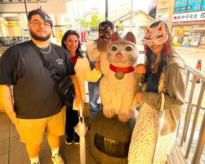 Tokyo: Gotokuji Lucky Cat Temple & Harajuku Cat Cafe Tour - Cat shops and sweets on the local shopping street