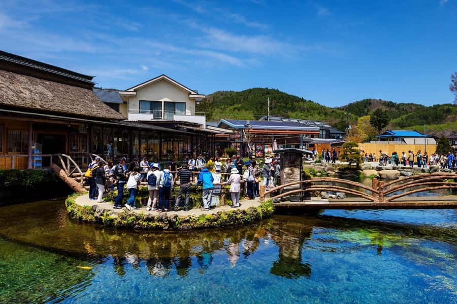 Tokyo: Private Mt.Fuji Day Trip with English-Speaking Driver - Oshino Hakkai adds water, shops, and local flavor