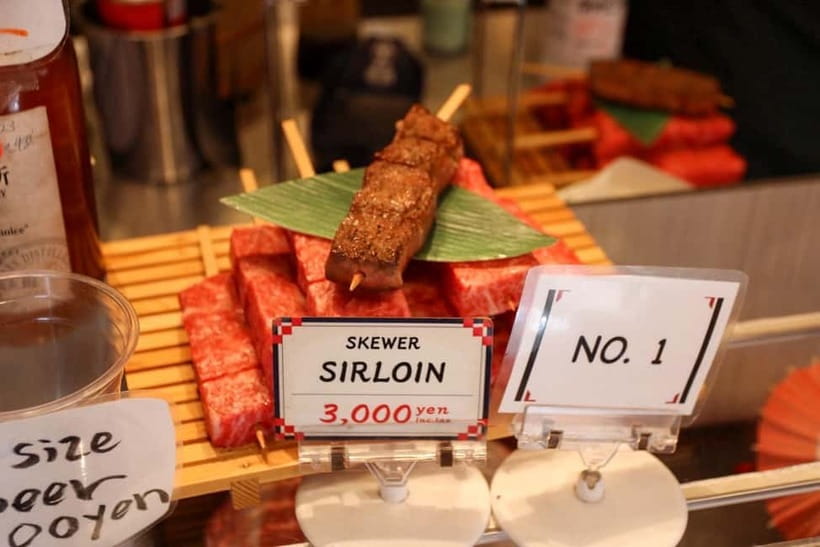 Tokyo: Private Tsukiji Street Food & Sake with Local Guide - The sake tasting with baby scallops