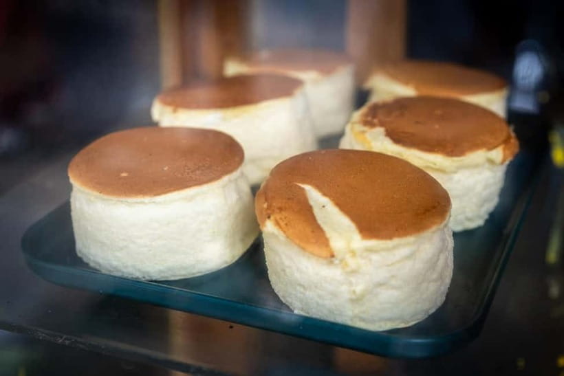 Tokyo: Shibuya Food Tour, Neon Lights & Local Flavors - Onigiri, sponge cake, and smaller food stops