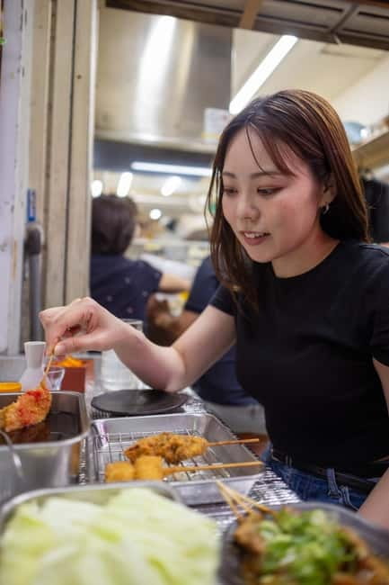 Tokyo: Shibuya Food Tour, Neon Lights & Local Flavors - Meeting Hachiko before the city starts moving