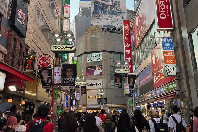 Tokyo: Shibuya Highlights Walking Tour - Moving from neon streets to local food and bars