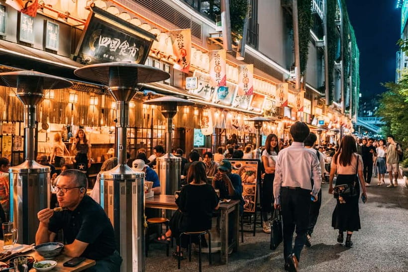 Tokyo: Shibuya Night Walking Tour with a Local Expert - Finding shrines between modern buildings