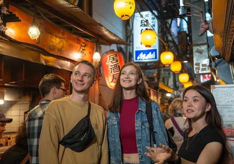 Tokyo: Shinjuku Bar Hopping & Night Walking Tour - Omoide Yokocho and the first plate of food