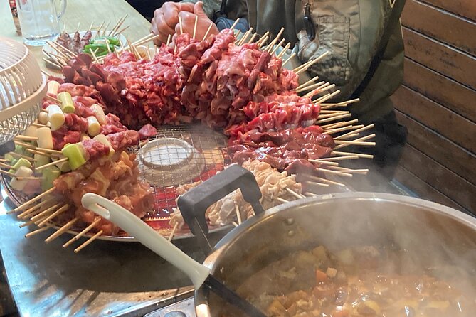 Tokyo Shinjuku Japanese Local Bar Hopping and Food Tour - Omoide Yokocho: narrow lanes and an izakaya start
