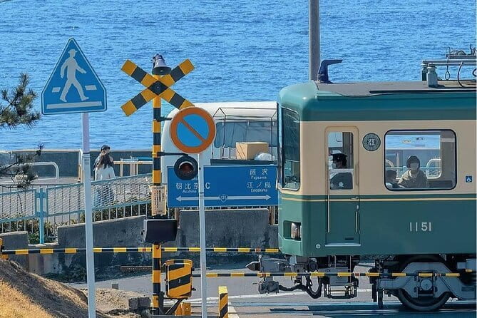 Tokyo Small Group: Enoshima & Kamakura, Hotel Pickup Option - The Enoden and Kamakura High School Front crossing