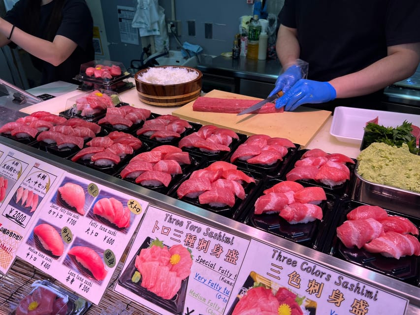 Tokyo: Tsukiji Fish Market Guided Walking Tour - Tsukiji Hongwanji: a calm opening to a food tour