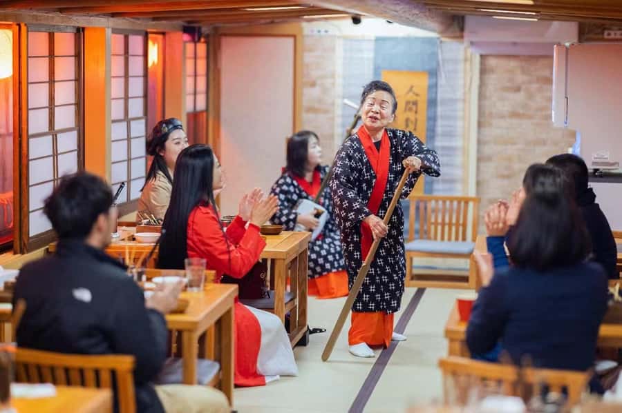 Tokyo: Yakatabune Dinner Cruise with Japanese Show & Drinks - Inside the cabin: sukiyaki and soft drinks