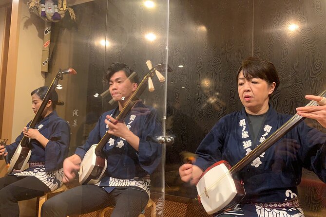 Tsugaru shamisen performance over traditional dinner - Walking roughly a mile to dinner