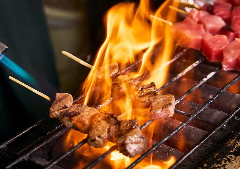 Tsukiji Fish Market: Street Food & Culture Walking Tour - Sampling street food at Tsukiji Jogai Market