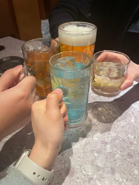 Japanese Style Pub Journey With Japanese University Students - Activity Description