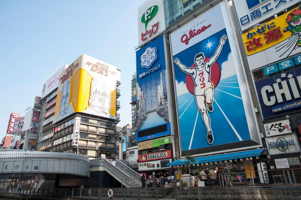 Osakas Dotonbori Audio Guide: The Vibrant District - Duration and Language Options