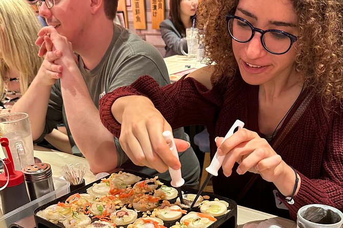 Takoyaki Party & Shinjuku Night Tour in Tokyo ※Unlimited Drinks - Booking and Cancellation