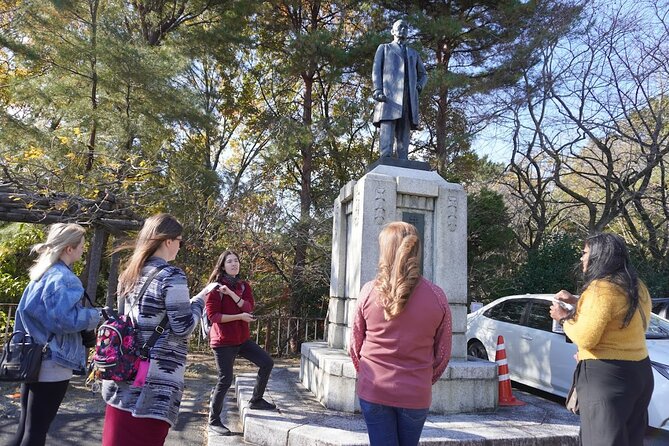 Birth of Takasakis White Robed Kannon Statue Guided Tour - Key Points